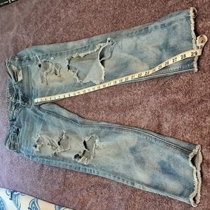 American Eagle VERY distressed denim.